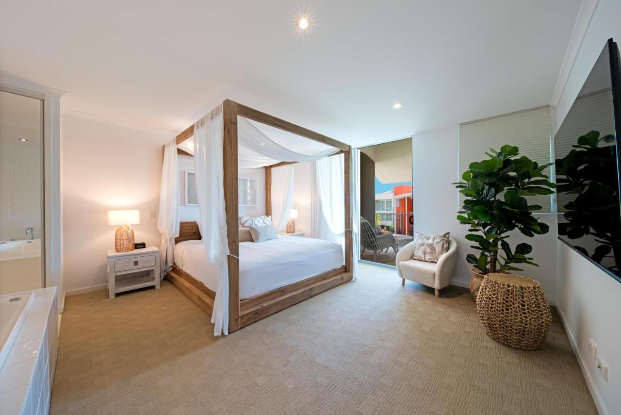 エアリービーチ アト マリーナ ショアーズアパートホテル エクステリア 写真 A bedroom in a house